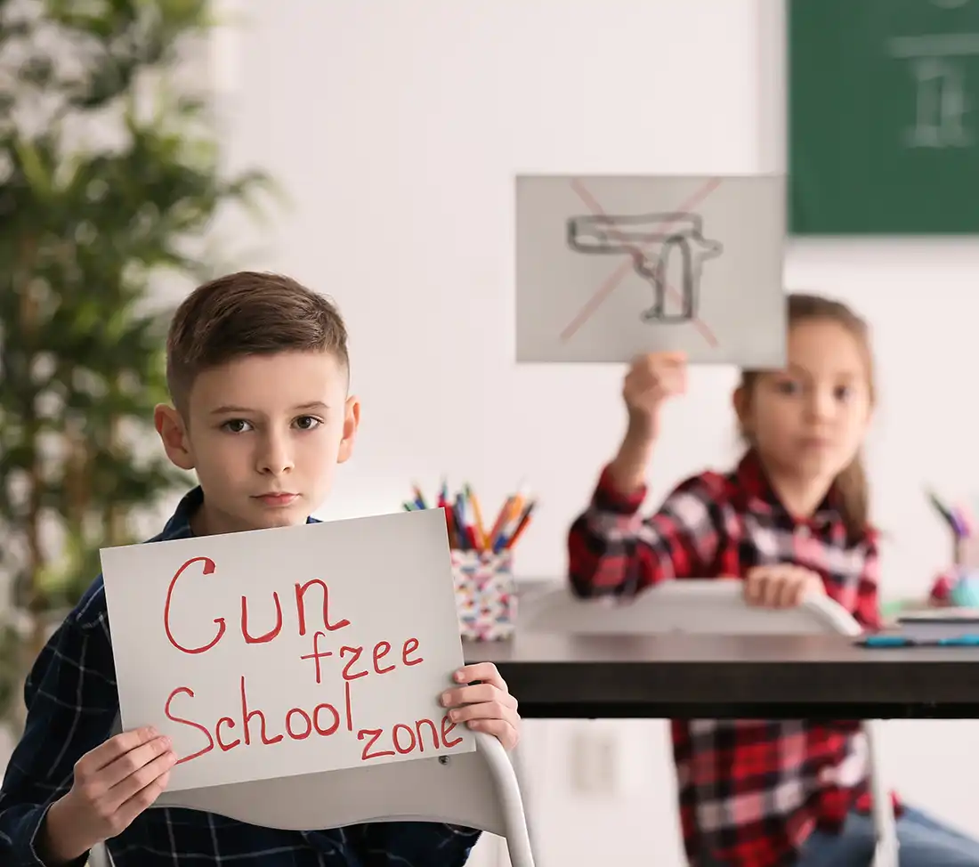 Kinderen vragen om een wapenvrije school